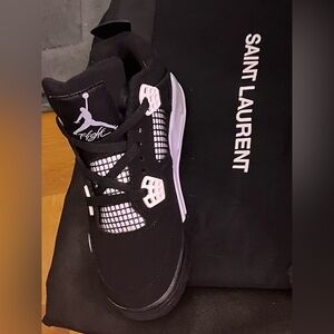 Women’s “White Thunder”  Air Jordan 4’s